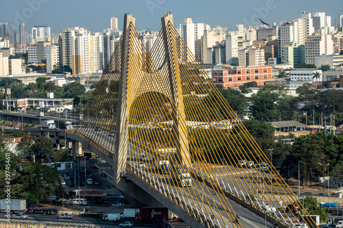 Vehicles traffic on Marginal do Tiete River Avenue and Governador Orestes Quercia Bridge, known as Estaiadinha Bridge, in the north of Sao Paulo city. photo