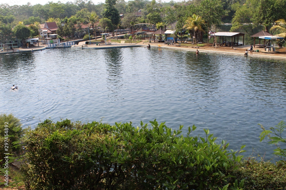 Fototapeta premium 'Selokambang' nature tourism is located in Puwosono Village, Sumbersuko District, Lumajang Regency, Indonesia. The water is clear and weekends are always crowded with visitors.