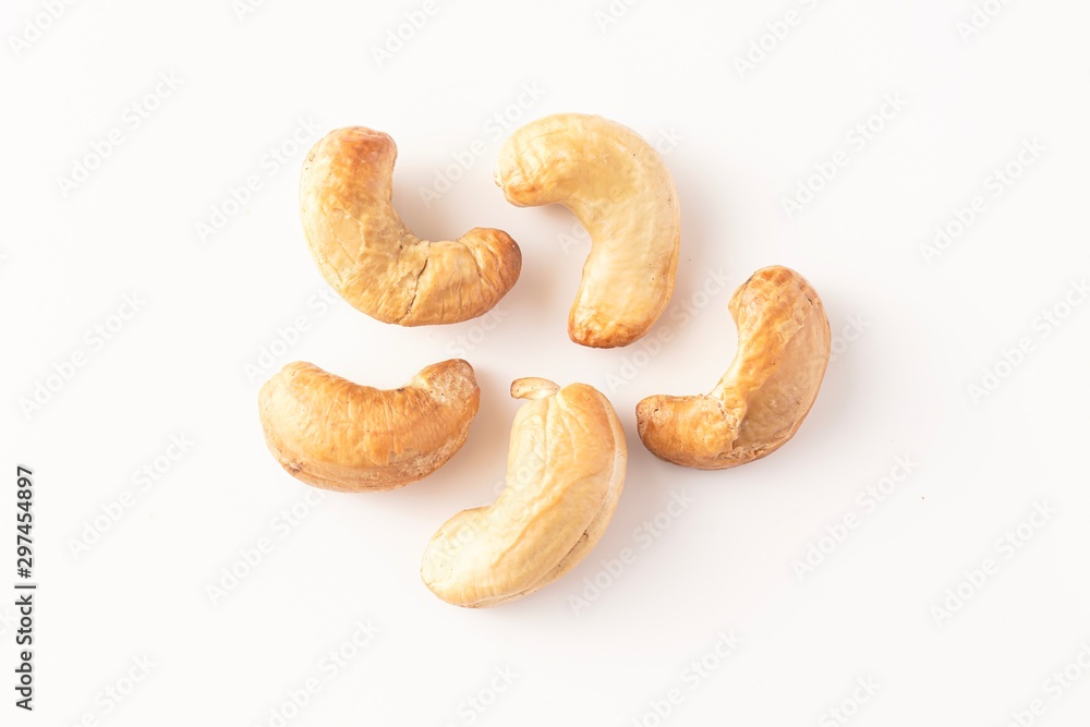 Cashew nuts isolated against white Cashew nuts isolated against white