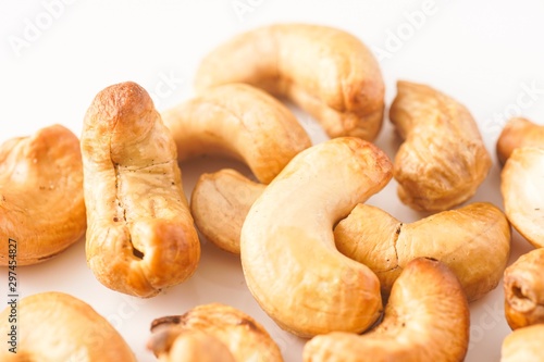 Cashew nuts isolated against white