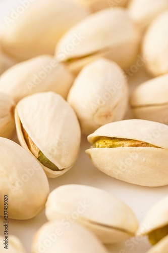 Pistachio nuts isolated against white