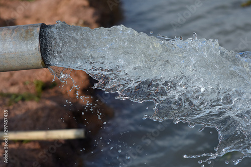 water flow out from pipe by pump supply for dry season