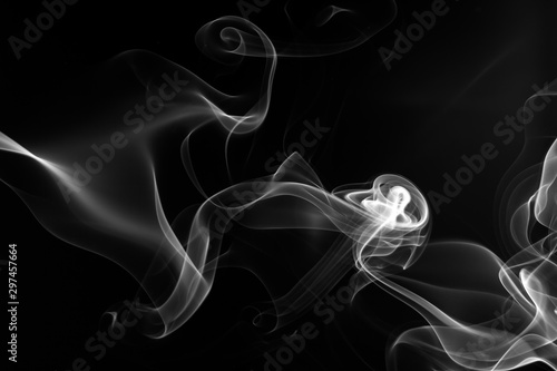 White smoke abstract on black background and darkness concept
