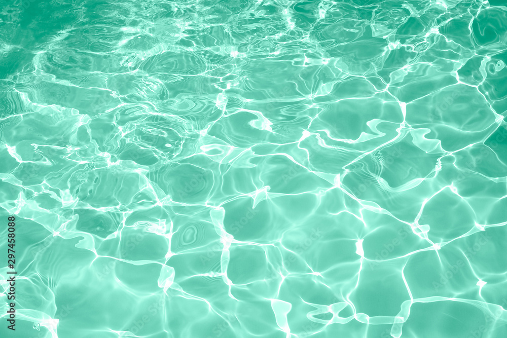 Surface of green swimming pool texture background, Beautiful water in swimming pool.