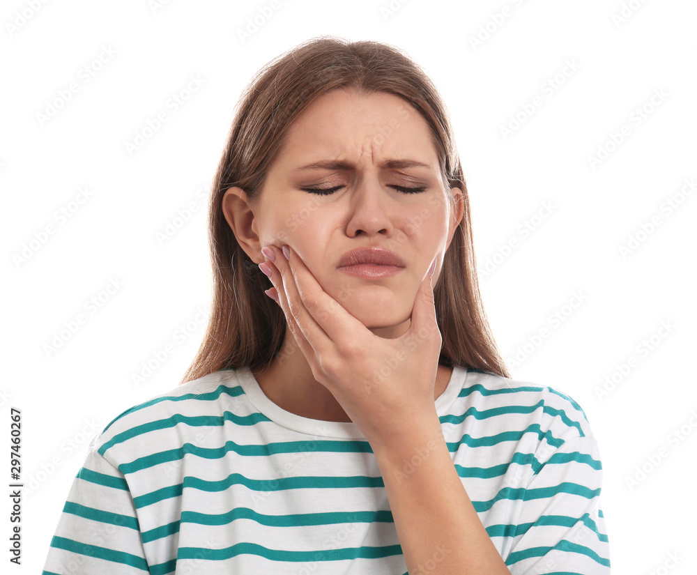 Young woman suffering from toothache on white background Young woman suffering from toothache on white background