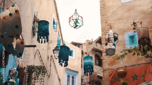 Stable shoot for a street in Chefchouen with beautiful lamps on it  and amazing decoration. Chefchaouen, Morocco photo