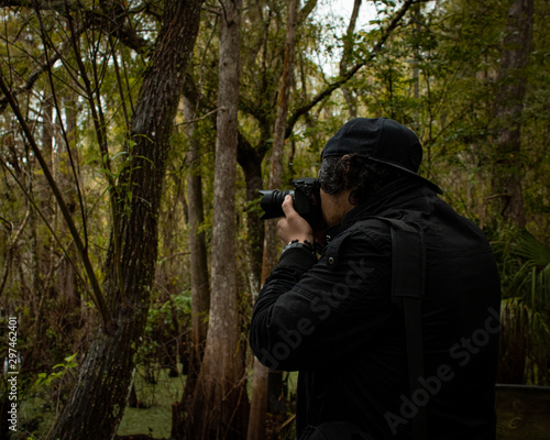 photographer in forest