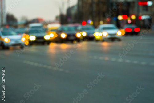 Fototapeta Naklejka Na Ścianę i Meble -  Abstract blurred background of evening city.Night traffic,colorful lights