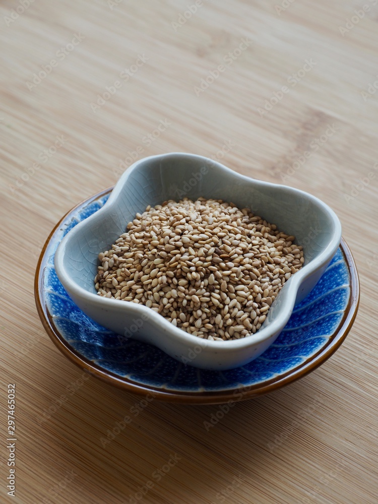 Sesame seeds in a ceramic bowl Sesame seeds in a ceramic bowl