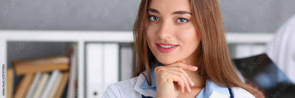 Beautiful smiling female doctor stand in office Beautiful smiling female doctor stand in office