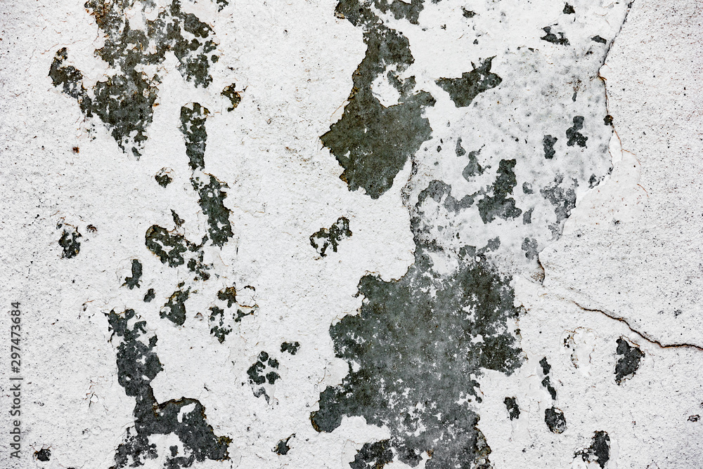 Fototapeta premium Texture of a concrete wall with cracks and scratches which can be used as a background