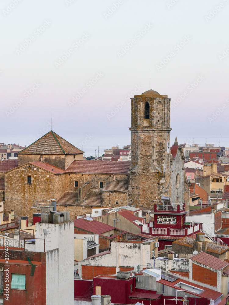 Topside view of the ancient old clock tower of Malgrat de Mar
