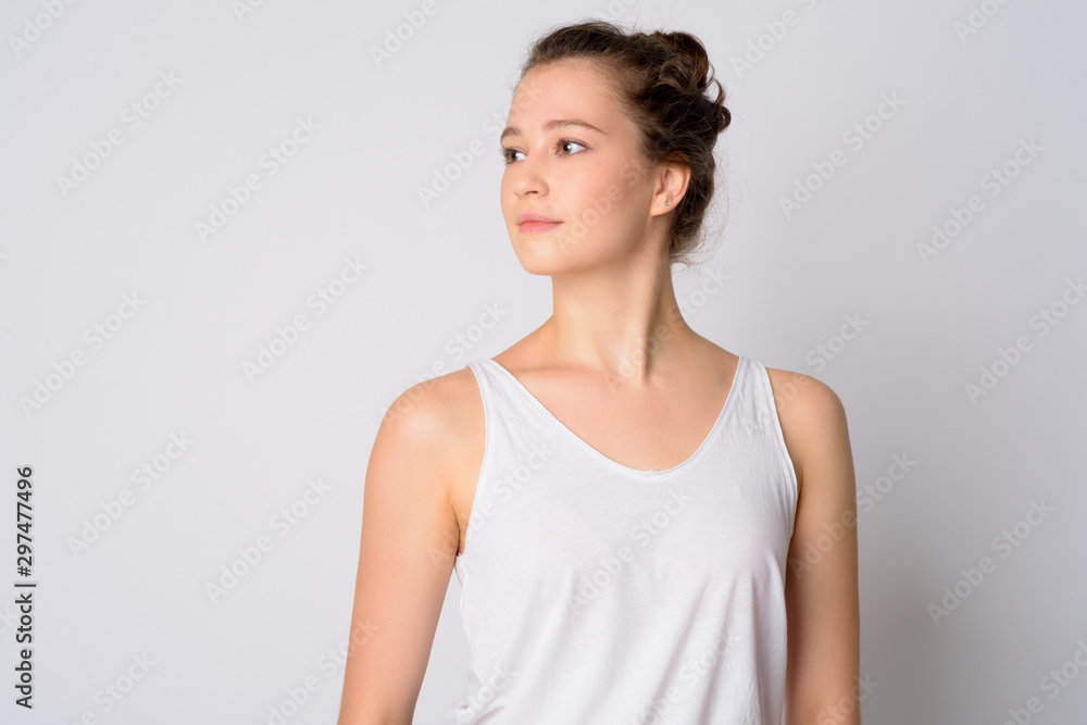 Face of young beautiful woman thinking and looking away Face of young beautiful woman thinking and looking away