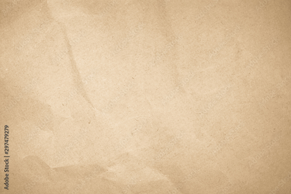 Naklejka premium Brown recycled craft paper texture as background. Cream paper texture, Old vintage page or grunge vignette. Pattern rough art creased grunge letter. Hardboard with copy space for text.