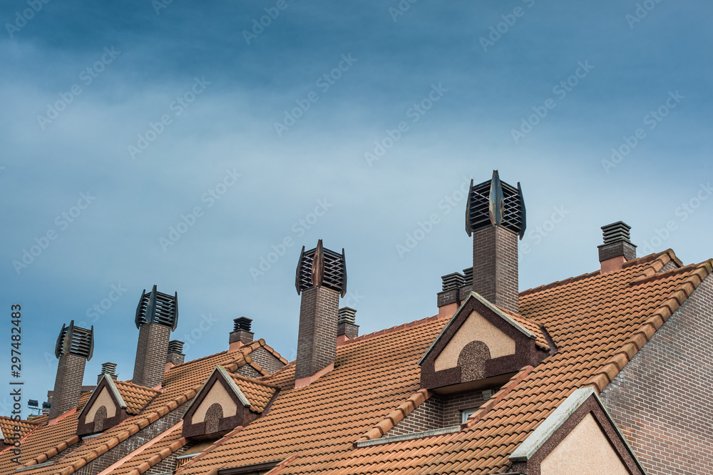 tiles roof houses with metal chimneys