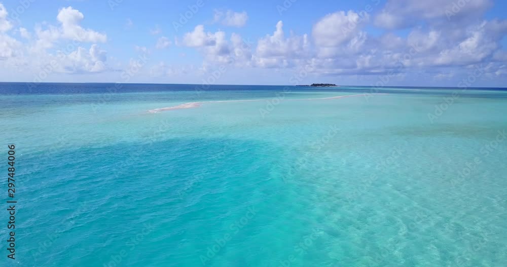 Tropical scenery from Hawaii, clear blue sky from transparent aquamarine water Tropical scenery from Hawaii, clear blue sky from transparent aquamarine water
