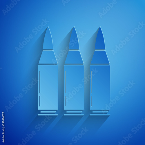 Paper cut Bullet icon isolated on blue background. Paper art style. Vector Illustration