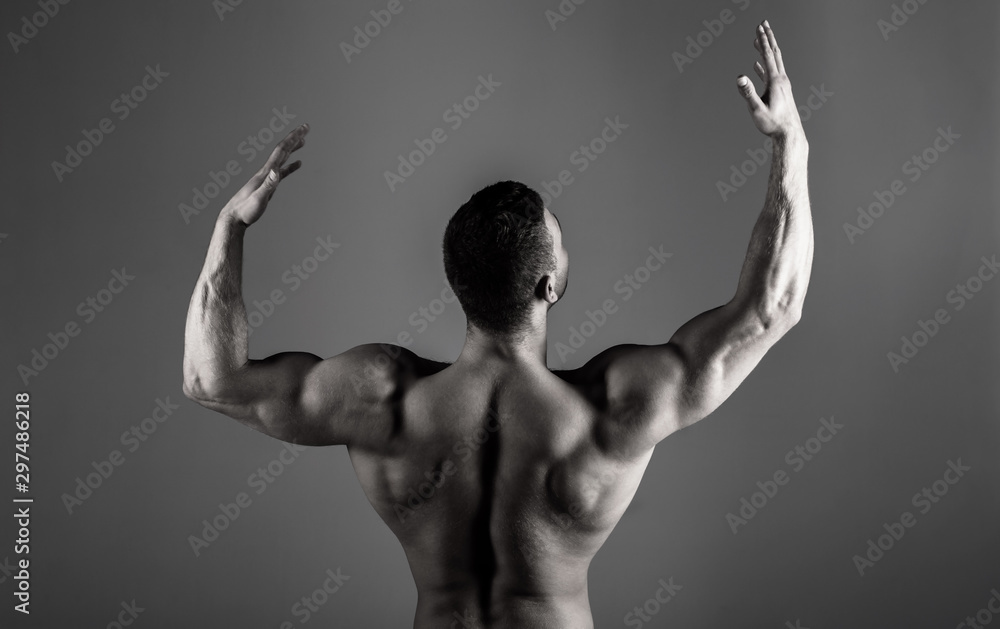 Obraz premium Body builder, muscled male, strong man, bodybuilder, muscular man, strong male. Brawny guy bodybuilder. Sporty guy male power. Fitness muscled man. Athletic caucasian. Bodybuilding, ab, sexy, naked