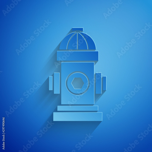 Paper cut Fire hydrant icon isolated on blue background. Paper art style. Vector Illustration