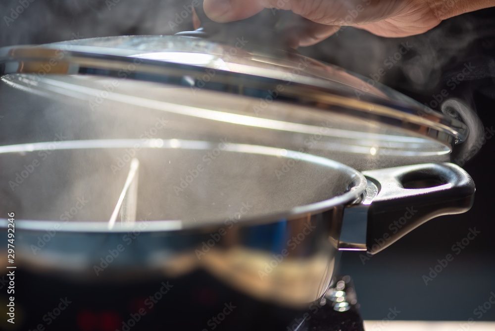 Obraz premium Shabu-shabu is a Japanese nabemono hotpot dish of thinly sliced meat and vegetables boiled in water. The term is onomatopoeic, derived from the sound emitted when the ingredients are stirred.