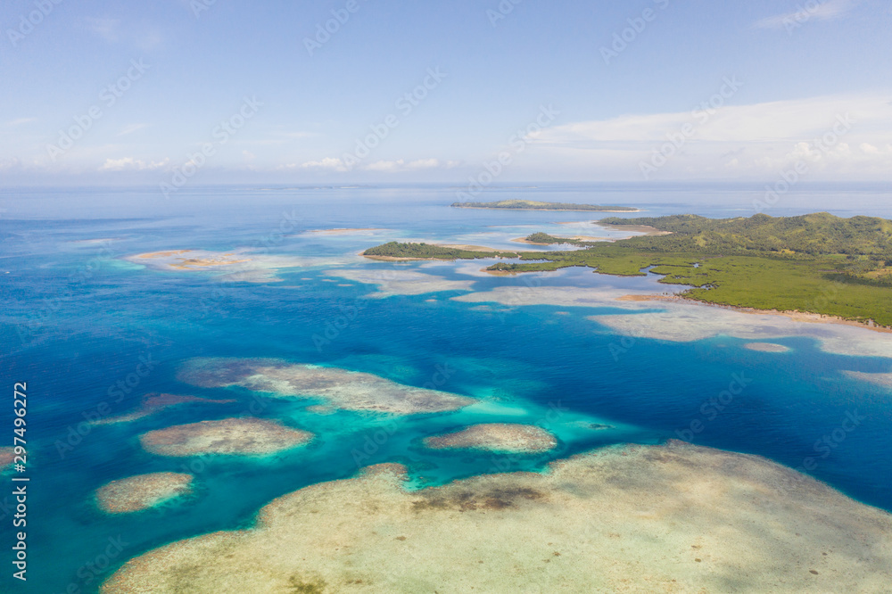 Bucas Grande Island, Philippines. Beautiful lagoons with atolls and islands, view from above. Seascape, nature of the Philippines. Bucas Grande Island, Philippines. Beautiful lagoons with atolls and islands, view from above. Seascape, nature of the Philippines.