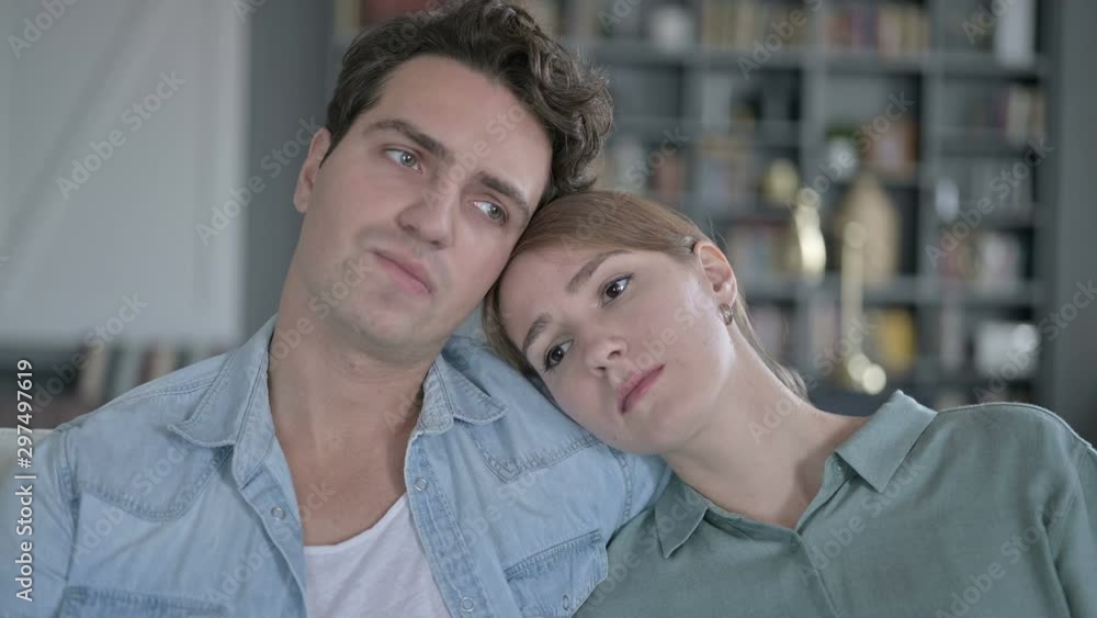 Sad Couple Resting on Head on Shoulder and Thinking Sad Couple Resting on Head on Shoulder and Thinking