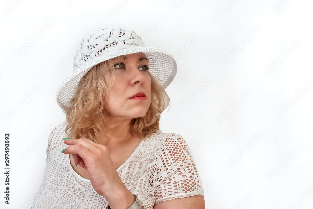 Portrait of a middle-aged blonde in white clothes, isolate. Place for text Portrait of a middle-aged blonde in white clothes, isolate. Place for text