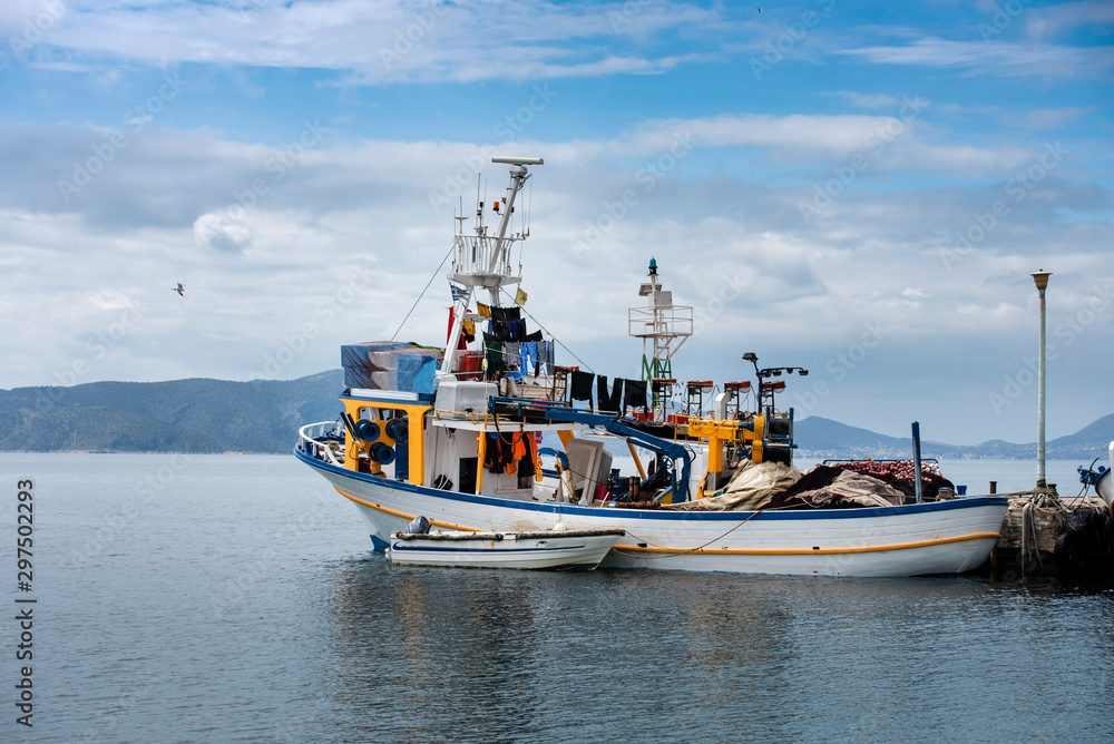 Fototapeta premium Fishing boats at small harbour in Pachi village. Megara,Greece
