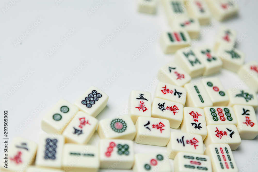 Pile of Mahjong ancient asian game on the white background Pile of Mahjong ancient asian game on the white background