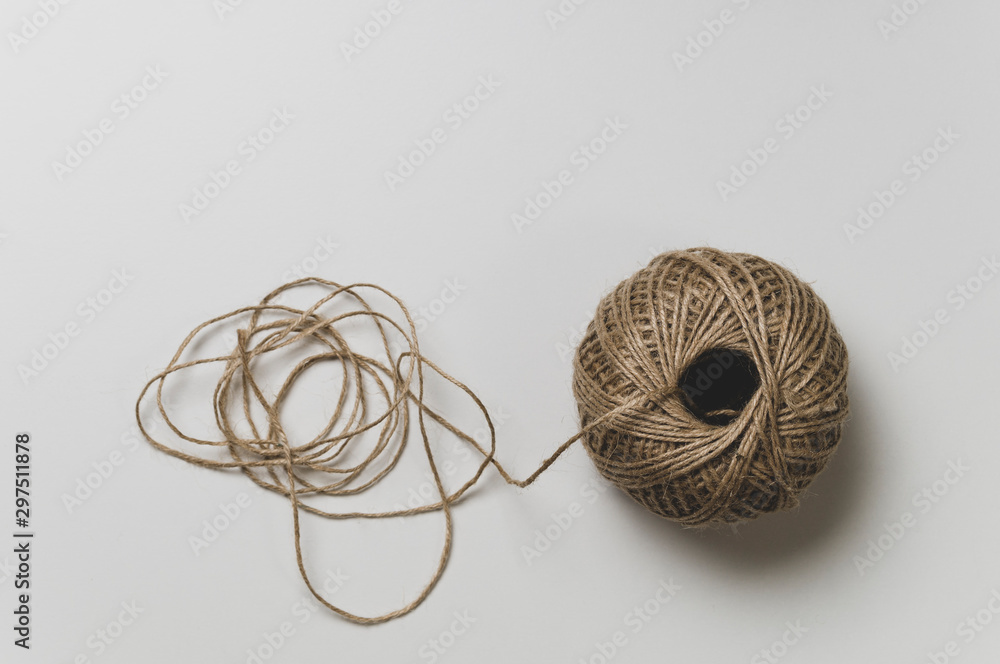 a ball of thread on a white background top view a ball of thread on a white background top view
