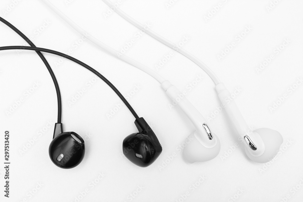 white and black earphone on white background white and black earphone on white background