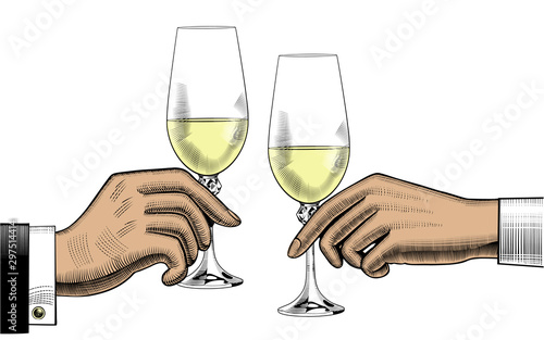 Hands holding glasses of champagne.