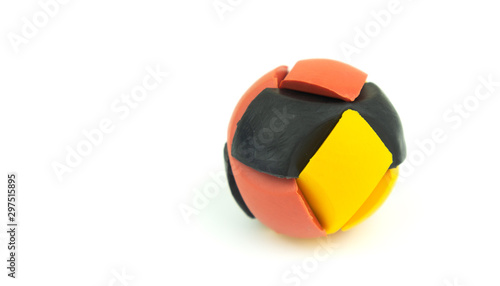 Colorful rubber puzzle ball isolated on white background.