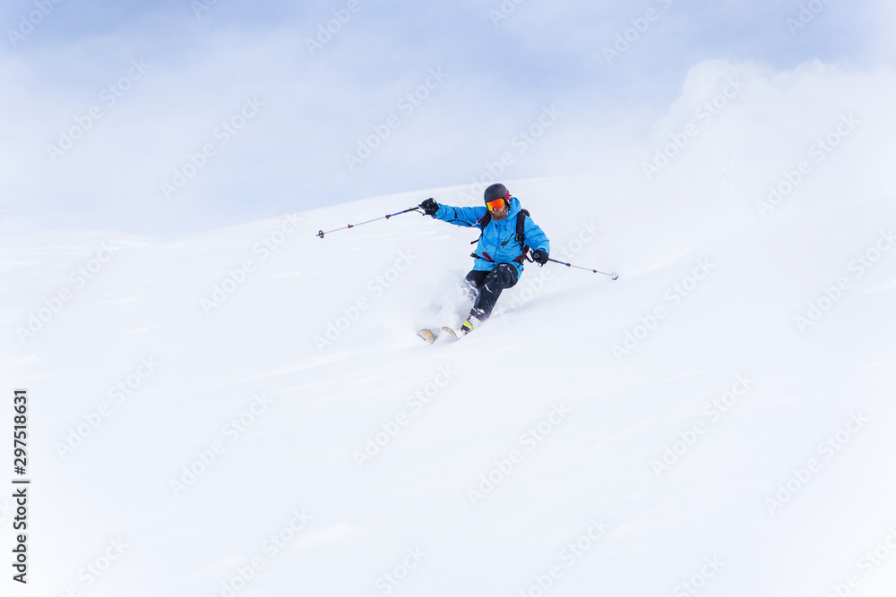 Image of sports man with beard skiing