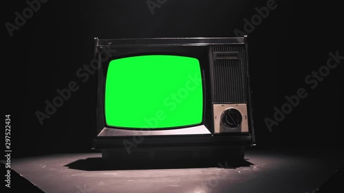 Vintage Tv Television Green Screen. Zooming into green screen of an old television vintage style 4k
