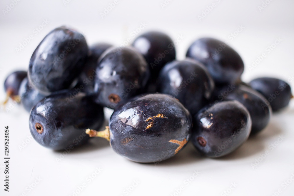 Big black spanish grapes over a white background Big black spanish grapes over a white background