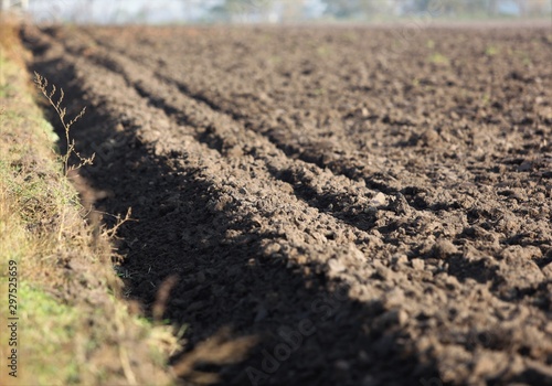 Autumn plowing on the edge of the village