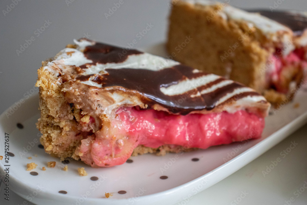 A piece of cheesecake with shortcrust pastry and chocolate.