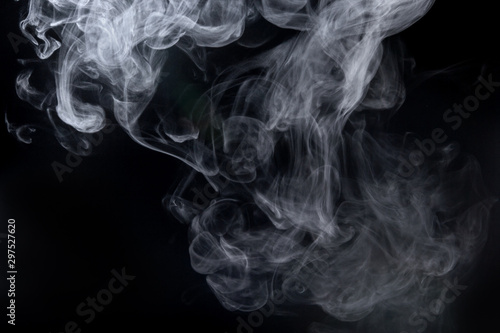 Abstract  powder or smoke isolated on black background © sirawut