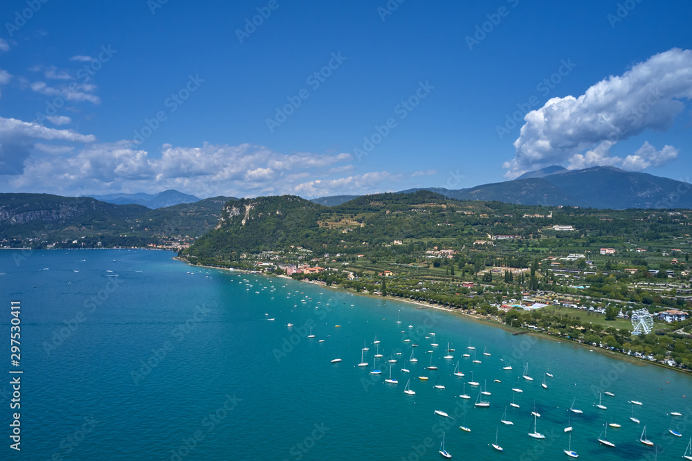 Aerial photography. Beautiful coastline. In the city of Bardolino, Lake Garda is the north of Italy. View by Drone.