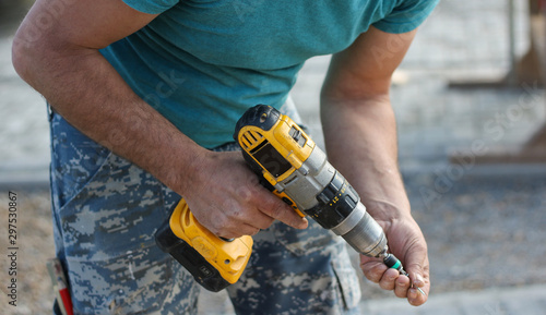 construction worker with drill tools 