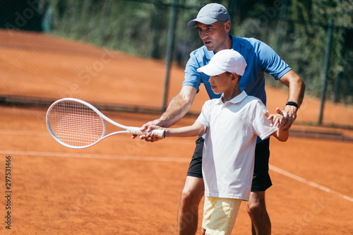 Boy on Tennis Training © Microgen