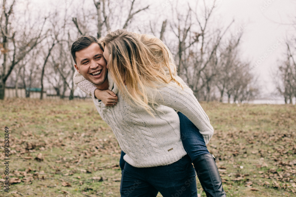 couple in love walks and cuddles in nature couple in love walks and cuddles in nature