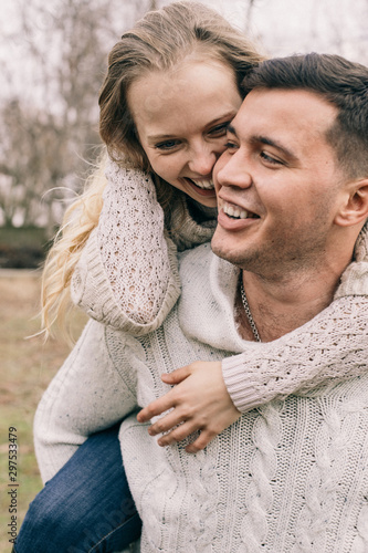 couple in love cuddles in the park