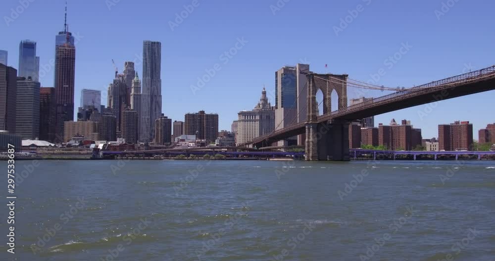Brooklyn Bridge and Lower Manhattan in a clear sunny summer day. Brooklyn Bridge and Lower Manhattan in a clear sunny summer day.