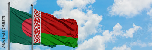 Bangladesh and Belarus flag waving in the wind against white cloudy blue sky together. Diplomacy concept, international relations.