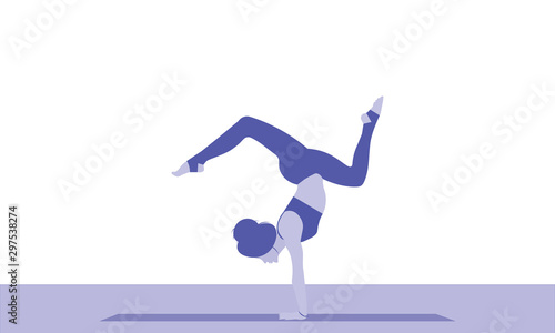A young woman stretches the entire front of the torso and chest, and throat in yoga Asana Bhuja Vrischikasana Arm Balance Scorpion Pose