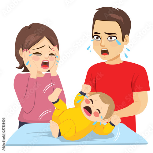 Two young tired parents desperate with baby ill crying