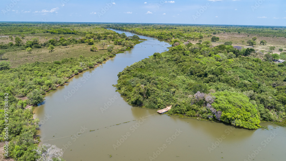 Areal view of typical Pantanal river meanderin through rainforest and deforested areas, Pantanal Wetlands, Mato Grosso, Brazil Areal view of typical Pantanal river meanderin through rainforest and deforested areas, Pantanal Wetlands, Mato Grosso, Brazil