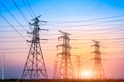 Electricity tower silhouette and sky landscape at dusk